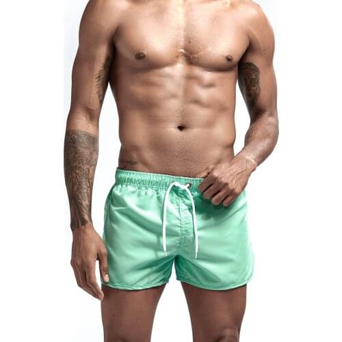 2020 Men Sport Running Beach Short Board Pants Hot Sale Swim Surfing Trunk Pure Color Pants Quick-drying GYM Swimwear All-match