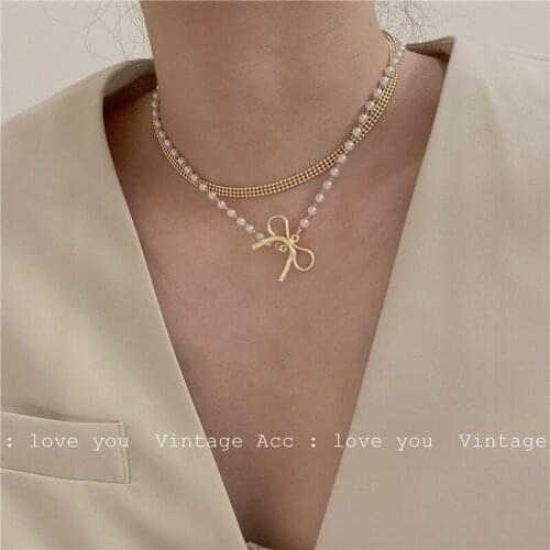 Fashion Retro Bow Necklace INS Metal Pearl Double Necklace Female Temperament Commuter Butterfly Necklace Trend