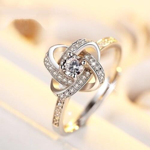 Simple and stylish inlaid zircon open ring Individual Zircon-studded four-leaf open ring Bride wedding jewelry