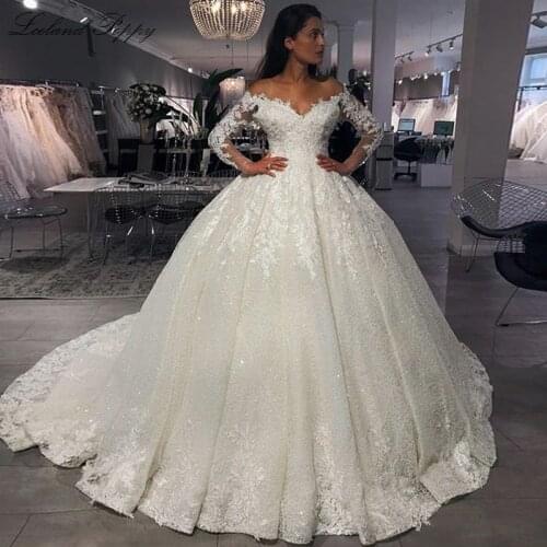 Lceland Poppy Off the Shoulder Ball Gown V-neck Lace Wedding Dresses 2020 Long Sleeves Lace Appliques Floor Length Bridal Gowns