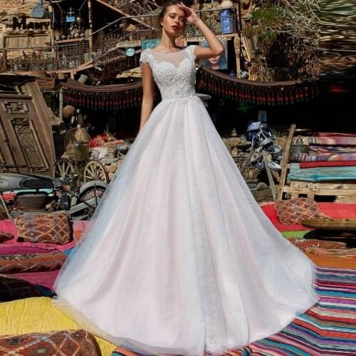 2021 New Arrival Cap Sleeve Embroidery Appliques Tulle Bridal Ball Gown High-End Backless O-Neck Chapel Train Wedding Dress