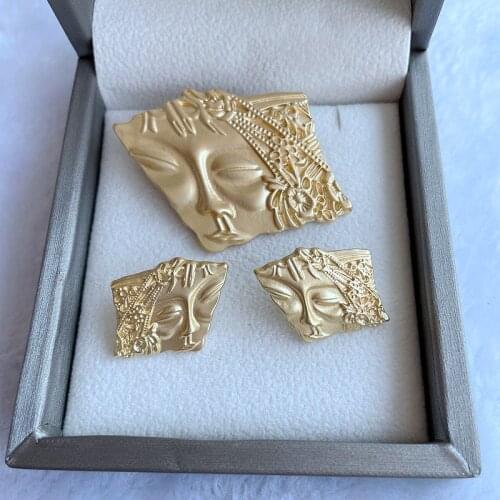Fairy baby Brooch silver pin Earrings brilliance decoration world re carved relief portrait left and right face alloy