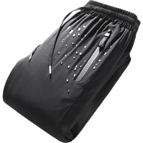 ANSZKTN new style 2020 new down pants winter thickening warm wind-proof white duck down foot pants over the cold sweatpants