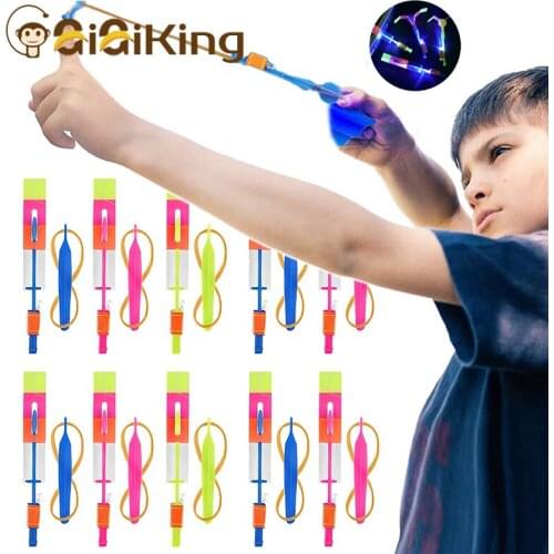 10PCS Outdoor Shining Rocket Flash LED Light Night Kids Luminous Slingshot Toys Shine Slingshot Elastic Helicopter Rotating Toy