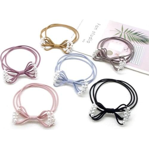 2pcs in) Fashion girls handmade Bowknot pearls Hair tie Band elastic circle gums toddler hair accessories DX131