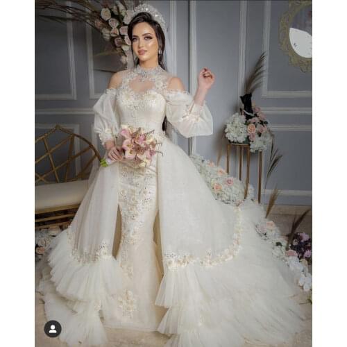 2021 Modest Wedding Dresses High Collar Appliqued Lace Flowers Bling Bling Long Sleeve Mermaid Vestidos De Novias with Overskirt