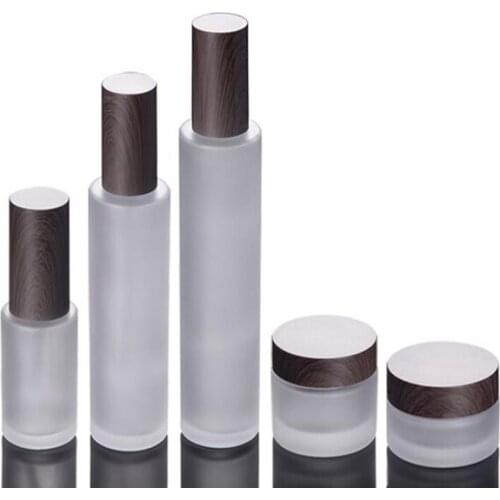 Frosted glass cosmetic jars pump bottles with plastic woodgrain cap 30g 50g 30ml 100ml 120ml body lotion lip balm cream containe