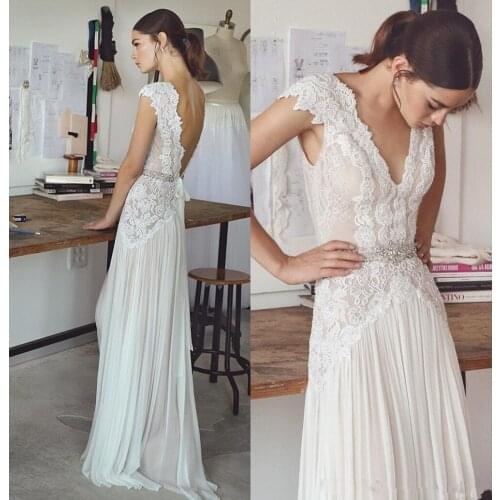 Vintage Boho Wedding Dresses 2020 Bohemian Bridal Gowns Cap Sleeves V Neck Pleated Skirt A-Line vestido de novia robe de mariee