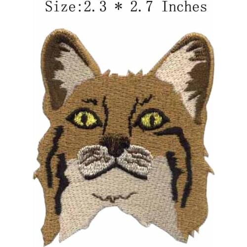 Animal head with yellow eyes 2.3"wide embroidery patch for whiskers/fur/brown