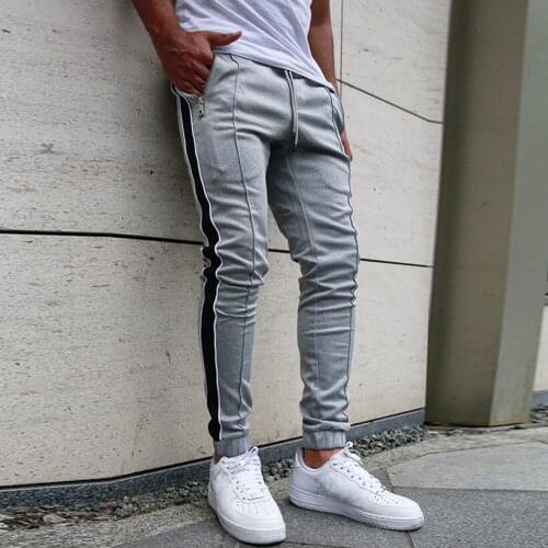 New Fashion Mens Jogger Pants Fitness Bodybuilding Trousers Gyms Pants Black and White Strip Streetwear Trousers Plus Size Male
