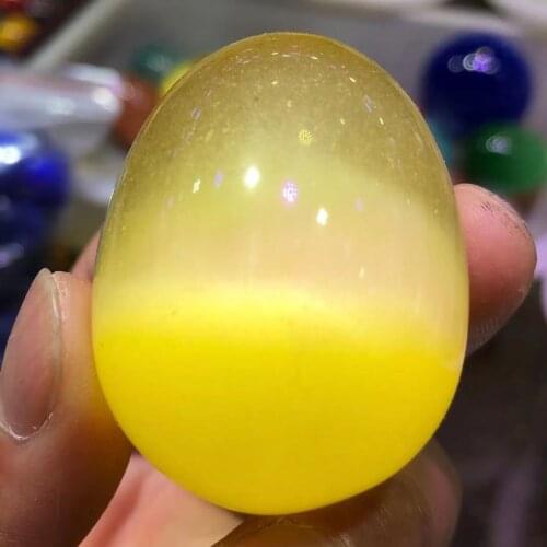 Natural yellow cats eye crystal egg divination energy stone photography egg decoration