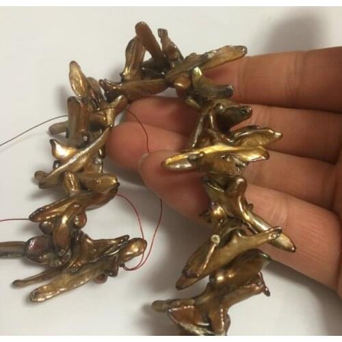 Freshwater pearl cross reborn keshi 15" 5.6