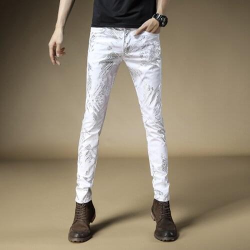 Free Shipping 2019 New mens male denim jeans Autumn brand printing slim feet pants Europe United States version thin trousers