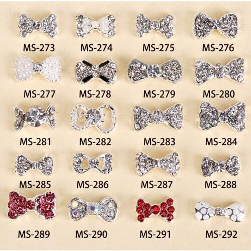Free Shipping 100psc New Silver Rhinestones Metal Bow 3D Nail Art Decorations Alloy Nail Charms Nails Rhinestones Nail Supplies