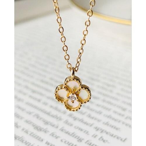 All-match black and white four-leaf clover necklace female white shell clavicle chain new 925 sterling silver female accessories