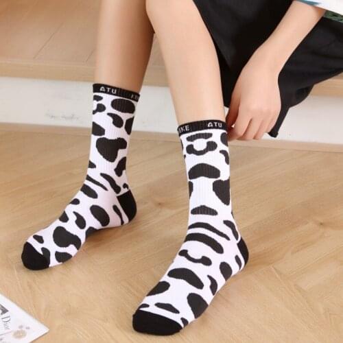 Men and Women South Korean Version of Black and White Dairy Cow Texture Spots Stockings College Wind Leisure Far Trend Socks