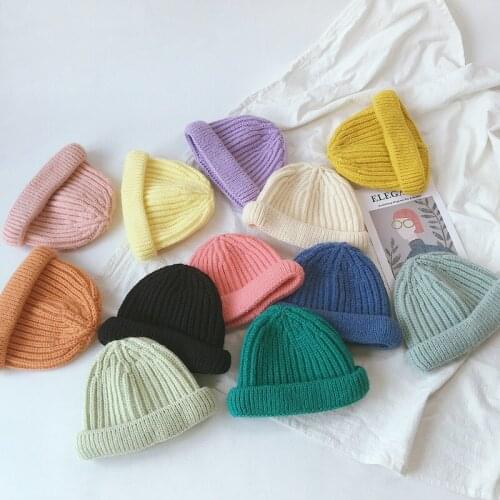 2020 New Childrens Hats Autumn and Winter Solid Color Cashmere Melon Leather Cap Warm Hood Knitted Ear Protection Woolen Cap
