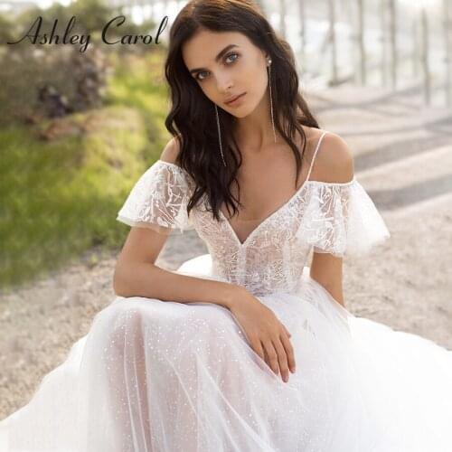 Ashley Carol A-Line Wedding Dress 2021 Flowy Beading Spaghetti Straps Beach Bride Dresses V-Neck Lace Appliques Boho Bridal Gown