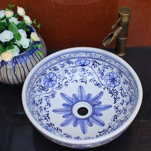 China Conventional Blue And White Countertop Wash Basin For Home Ornament