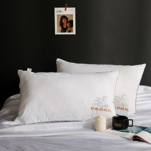 Swan-Printed Silk Down Sleep Pillow on the Bed High Elasticity and Light Sleep Pillow for Travel and Home for Family