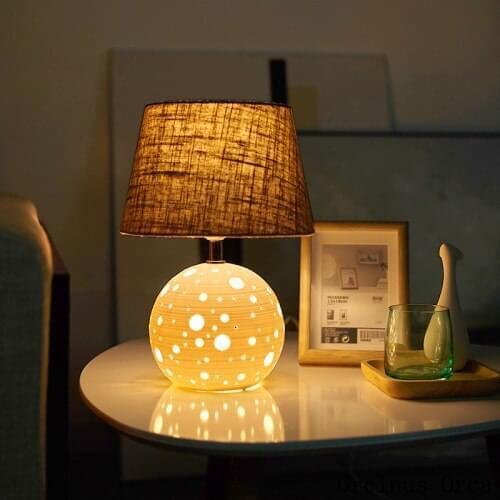 Nordic modern simple hollow ceramic table lamp living room bedside lamp creative romantic LED table lamp free shipping
