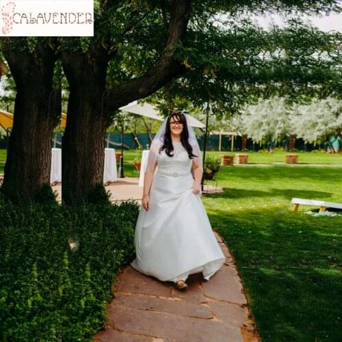 Illusion Lace O-Neck Plus Size Wedding Dress Beaded Waist Satin Wedding Gowns Short Capped Sleeve Vestidos De Novia