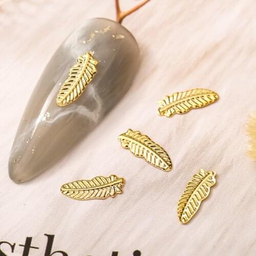 100PCS Wholesale Nail Accessories Metal Feather Golden, Manicure 3d Flash Leaf Cute Alloy Charms Nail Art Decorations Tools