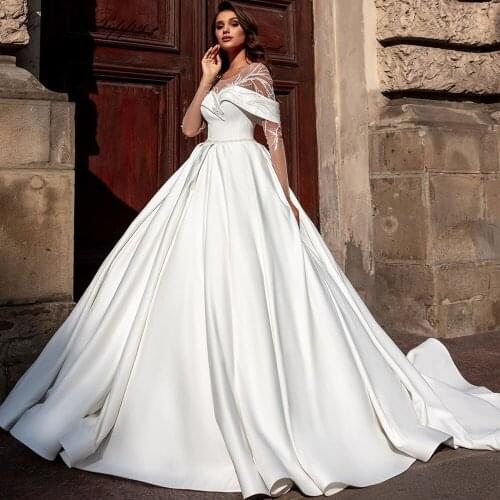 Lceland Poppy Womens A Line Satin Wedding Dresses Full Sleeves Floor Length Beaded Court Train Bridal Gowns Vestido de Noiva