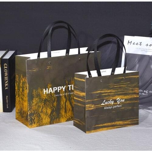 Retro clothing gift paper bag in stock rectangular cosmetic paper row rope portable shopping bag simple gift bag Dragees for C