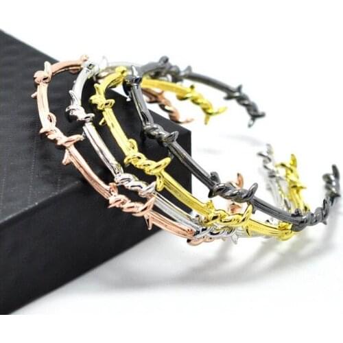 1pcs Titanium steel new European and American winding knotted thorn twisted wire couple opening Djula bracelet