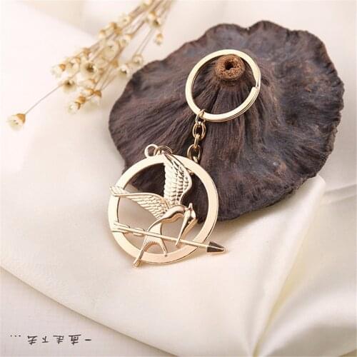 The Hunger Games Keychain Popular Vintage Style Birds Charm Golden Snitch Pendent Key Chain Keyrings Metal Keychains Car Holder