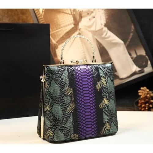 2021 New Leather Middle-aged Small Bag Women Handbags Fashion Female Serpentine Portable Clip Bag Mother Shoulder Evening Bags