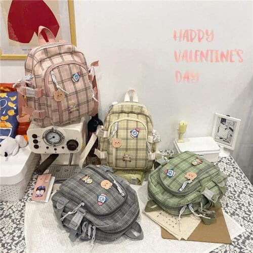 2021 Small Fresh Schoolbag Female Version of Junior High School Ins Lattice Backpack Girl Heart Large Capacity Casual Backpack