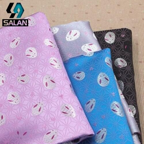 Cute little rabbit imitation silk cloth dress dress cheongsam fabric imitation Hong yarn high - grade high - quality fabrics