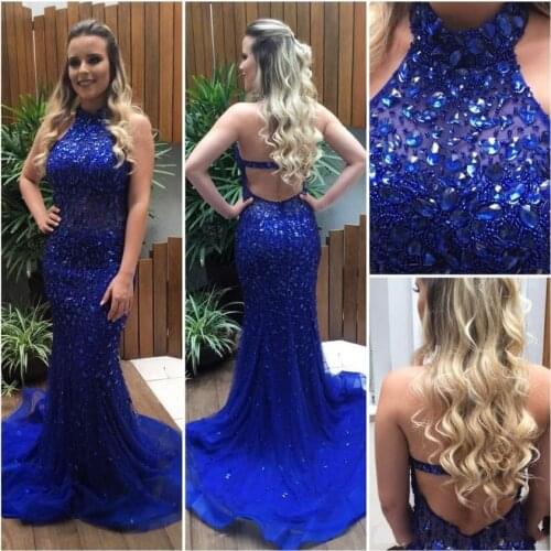 2020 Luxury Royal Blue Mermaid Evening Dresses Halter Crystal Beaded Tulle Backless Champagne Prom Dresses Formal Gowns