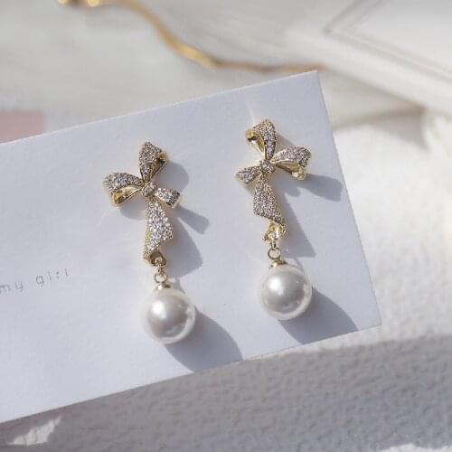 Korean fashion jewelry 14K real gold plating exquisite copper inlaid zircon bow earrings sweet beauty pearl pendant earrings