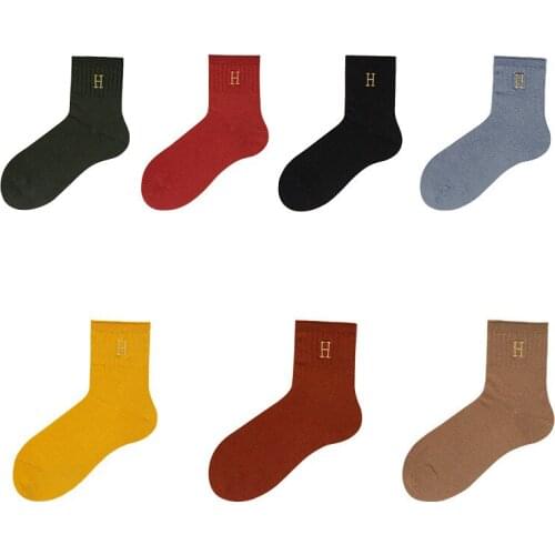 Autumn and winter fashion simple unisex couple wool socks 2020 new letter embroidery men and women medium tube socks