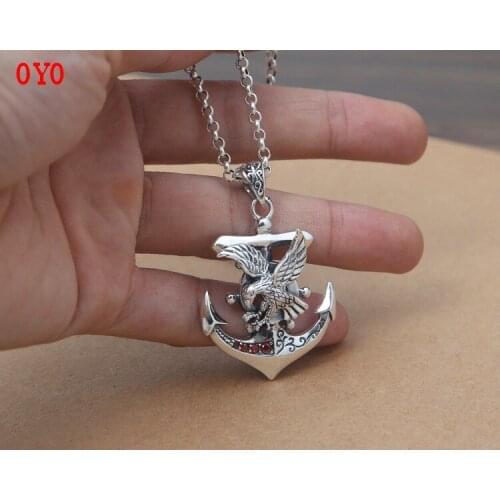 Real S925 sterling silver fashion jewelry, exquisite Japanese and Korean men and women retro flying eagle anchor red zircon pend