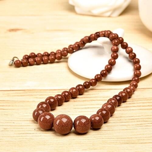 Beads as as sand and golden Prominent jewelry Sand stone Necklace Brown beads give off an attractive sheen