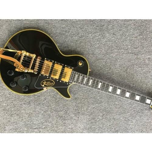 3 Pickups Custom Shop Electric guitar,Solid Mahogany body With Black paint and yellow binding,Golden Hardware,free shipping