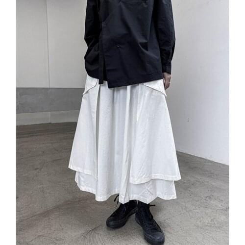 Large size dark high waist skirt womens 2021 spring new fashion versatile slim irregular pocket A-line skirt