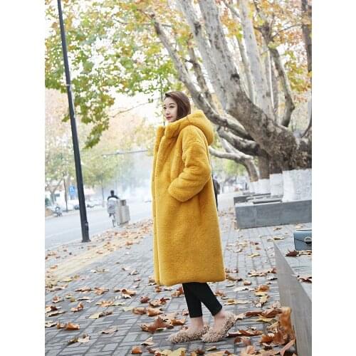 Winter Faux Fur Coat Women Hooded Thick Warm Faux Fur Jacket Ladies Winter Long Coat 2020 Female Loose Plush Coat Oversized S-XL