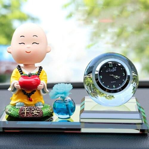Vehicle perfume Car perfume accessories Small monk shaking his head Interior decorations Automobile decoration Vehicle clock