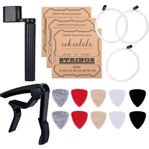 Guitar/Ukulele Tool Kit 10pcs Soft Felt Ukulele Picks(Random Color) 3 Set of String(4pcs/Set) 1pc Clip-on Capo 1pc String Winder
