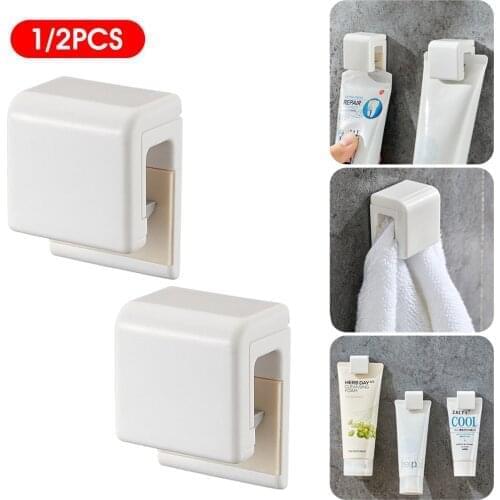 1pc Toothpaste Hanging Holder Clip Facial Cleanser Clip Wall Mount Self Adhesive Organizer Home Storage Kit
