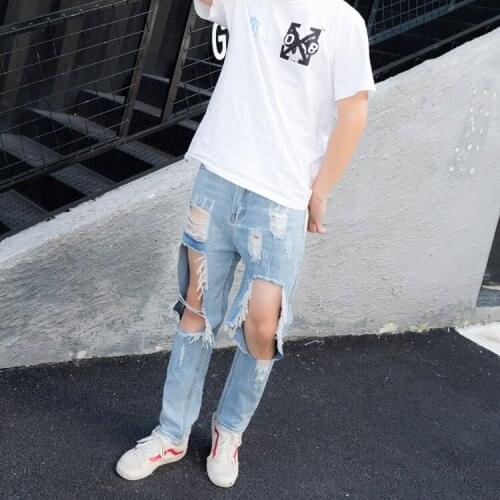 Trendy mens summer big hole leakage knee 9 / 9 jeans mens and womens lovers' Korean version thin beggar pants