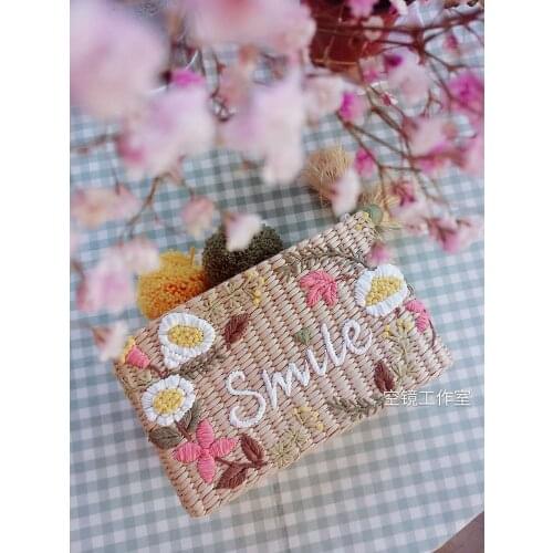 Studio custom-made new Thai several straw embroidered flower hairball hand-held sloping womens bag