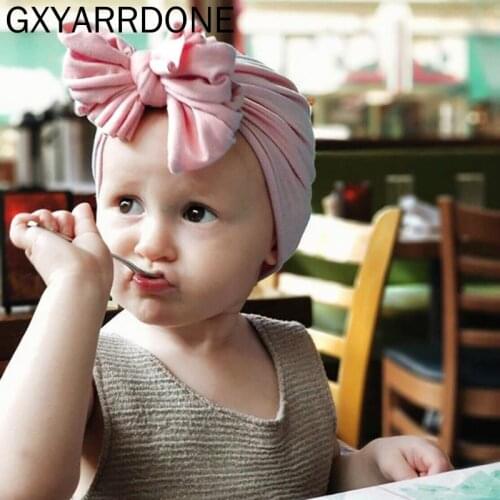 2019 New Lovely Bowknot Hats For Baby Girls Children Candy Color Top Knot Cotton Soft Beanies Hat Caps Newborn Turban Wrap