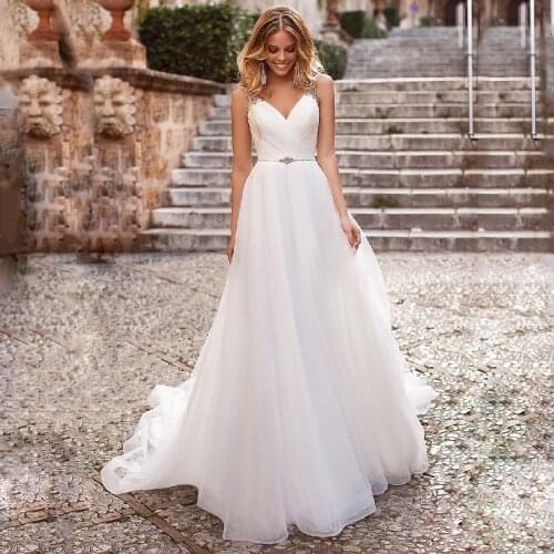 Spaghetti Straps Backless Wedding Dresses with Rhinestones Crystals Robe de Mariee Bride Dress 2020 V Neck White Bridal Gown New