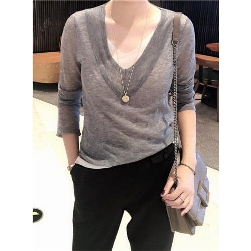 2021 spring new womens v-neck long sleeve top stitching foreign style fake two-piece sweater